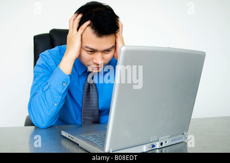 Man at computer Stock Photo