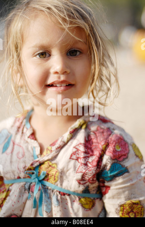 Portrait of a beautiful and tender mixed race small girl Stock Photo