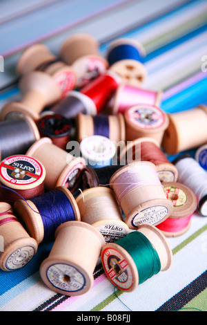 Pile of sewing bobbins Stock Photo