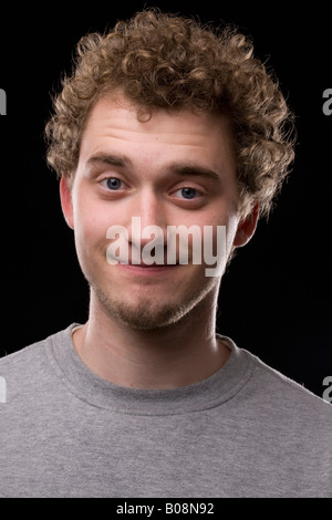 Portrait of a curly-haired young man Stock Photo