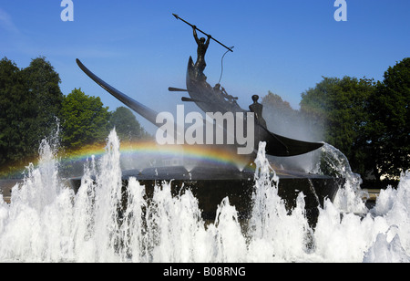 Rainbow over controversial whaling monument surrounded by a fountain created by Norwegian sculptor Knut Steen, Sandefjord, Vest Stock Photo