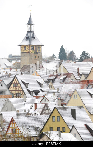 View over snow dusted rooftops, timber framed houses and Upper Gate Tower of the historic centre of Marbach am Neckar, Baden-Wu Stock Photo