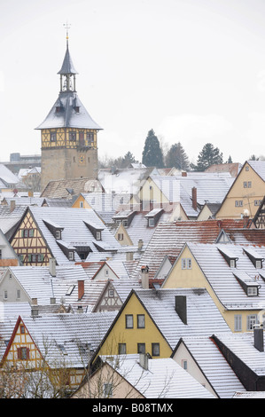 View over snow dusted rooftops, timber framed houses and Upper Gate Tower of the historic centre of Marbach am Neckar, Baden-Wu Stock Photo