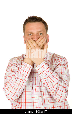 40 year-old man holding his mouth shut Stock Photo