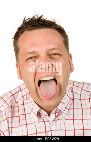 40-year-old man sticking out his tongue Stock Photo