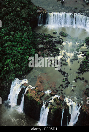 South America, Brazil, Argentina, Igwazu, Igwacu Falls thunder into the Igwacu River below. South America, Brazil, Argentina, Igwazu, Igwacu Falls thunder into the Igwacu River below.