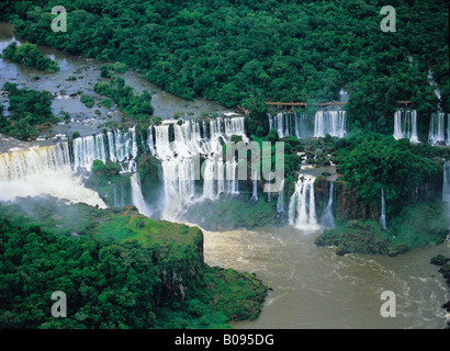 South America, Beazil, Argentina, Igwazu Falls. Igwacu Falls thunder into the Igwacu River below.