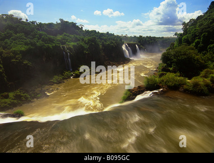 South America, Argentina, Brazil, Igwazu Falls. Igwacu Falls. Igwacu River thunders forward to the next cascade.