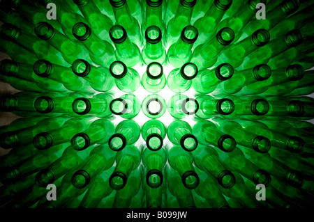 Empty green beer bottles ready to be filled with beer or recycled Stock Photo