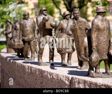 Miniature bronze statues of people , Finland Stock Photo