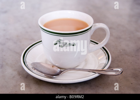 Tea at Raffles Hotel Singapore The logo and style of the cup and saucer date back to the designs used in the 1920s Stock Photo