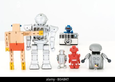Robots taking group photo Stock Photo