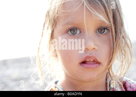 Portrait of a beautiful and tender mixed race small girl half thai Stock Photo