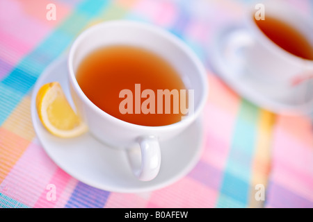 A view of a cups of tea and a lemon Stock Photo