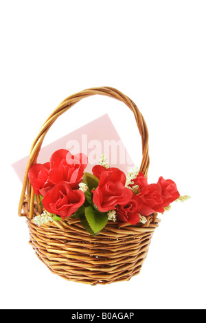 Red Roses and Greetings Card in Basket Stock Photo