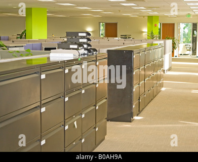 Corporate office settings showing desks cubicles files and conference space Stock Photo