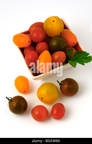 Varied cherry tomatoes, also peardrops. Stock Photo