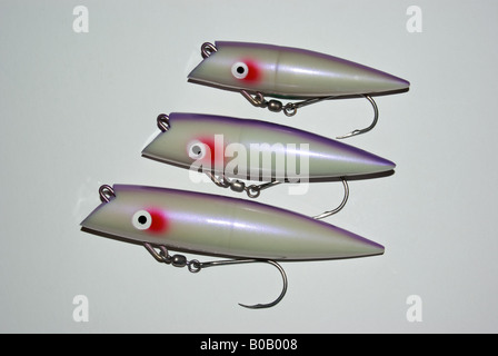 Large Tomic #530 UV Purple Glow trolling plug fishing lure will attracts salmon and bottom fish. Stock Photo