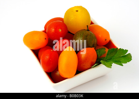 Varied cherry tomatoes, also peardrops. Stock Photo