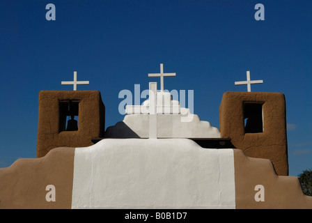 Old adobe church with white crosses in the Martinez Hacienda Taos New Mexico USA Stock Photo