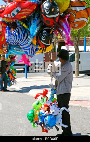 Balloon seller in a fair Stock Photo