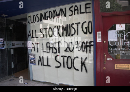 Shop window closing down sale price reductions Stock Photo