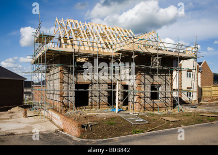 House under construction on new Barratt Homes housing estate Llanfoist Wales UK Stock Photo