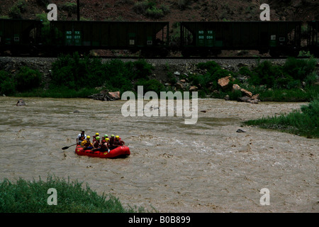 Group in an inflatable raft on the Arkansas River Stock Photo