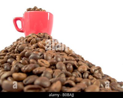 espresso cup on top a pile of coffee beans Stock Photo