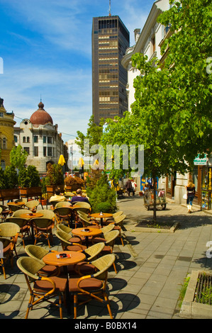 Cafe terrace along Kralia Milana street with Beogradjanca building in background Belgrade Serbia Europe Stock Photo
