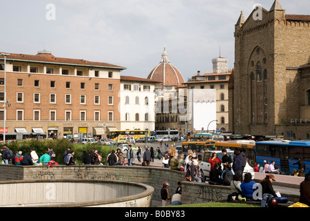 the streets in front of Santa Maria Novella railway station Florence Duomo in background Stock Photo