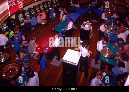 Gambling in Diamond Tooth Gertie's Gambling Hall, Dawson City, Yukon Territory, Canada - Gamblers playing at Blackjack Tables Stock Photo