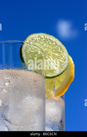 Glasses of water with ice, lemon and lime Stock Photo