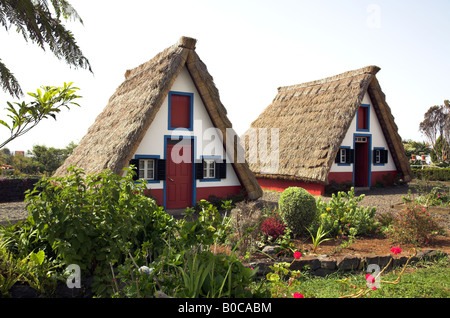 A-framed house or Palheiros are traditional Madeiran homes found in the town of Santana. Stock Photo