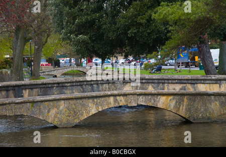 Bridges over River Windrush in village of Bourton on the Water Cotswolds Gloucestershire England UK EU Stock Photo