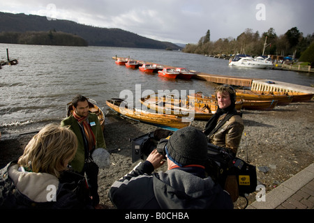 BBC Filming the series Street Doctor at Bowness Bay on Lake Windermere with Doctor Ayan Panja  and film crew and sound engineer Stock Photo