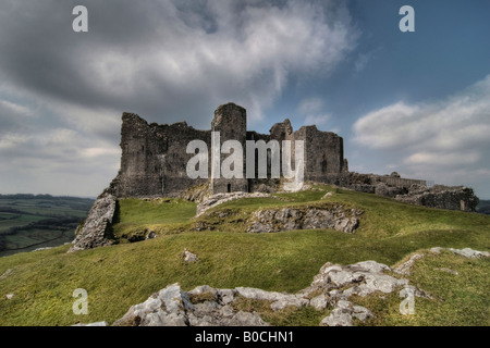 This is a photograph of Carreg Cennen Castle located in Trapp in Llandeilo. It is taken on the approach up the hill Stock Photo