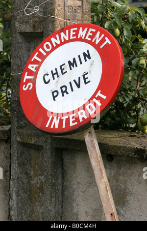 French stationnement interdit chemin prive private lane no parking sign Stock Photo