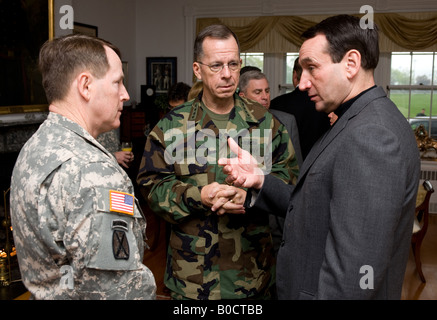 Adm Mike Mullen with Lt Gen Robert Hagenbeck and Duke University Head Basketball coach Mike Krzyzewski Stock Photo