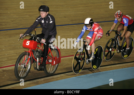 Victoria Pendleton Great Britain sprinter first round of Keirin competiition follows Derny pace bike Stock Photo