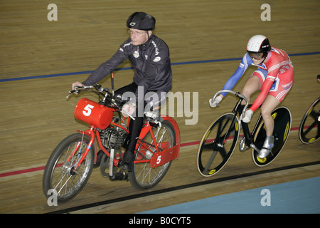 Victoria Pendleton Great Britain sprinter first round of Keirin competiition follows Derny pace bike Stock Photo