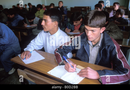 Kabul boys in the classroom of a secondary school Stock Photo