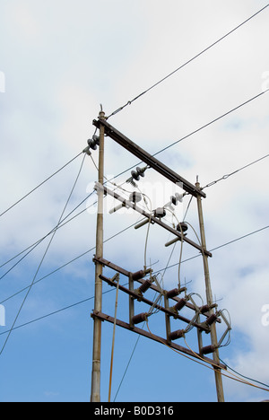 Electricity lines and poles in a rural area of South Africa. Stock Photo