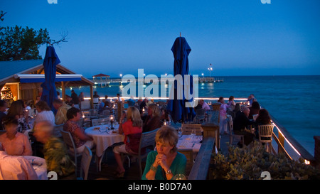 Outdoor photo of Louie's Backyard restaurant in Key West Florida at dusk Stock Photo