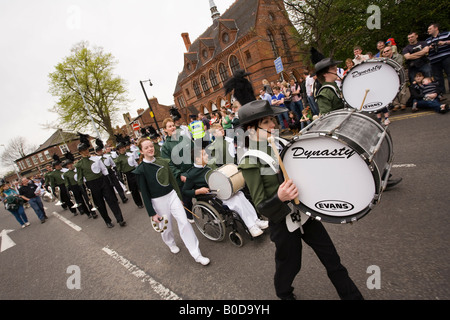 UK Cheshire Knutsford Royal May Day Procession disabled drummer in marching band Stock Photo