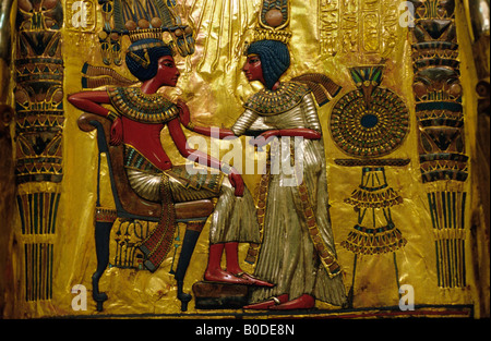 Detail of the back of Tutankhamuns throne depicting the king himself Stock Photo