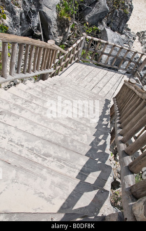 Wooden steps leading down to the sandy beach at Tulum, Mexico Stock Photo