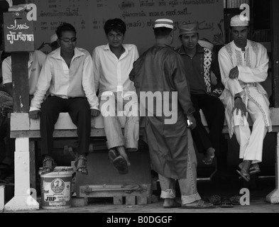 young muslim men, outside mosque on eid ul fitr festival, koh samui Stock Photo