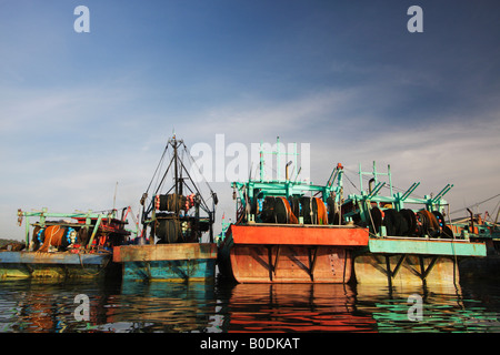 Fishing Boats Reflected In Water, Pulau Labuan, Sabah, Malaysian Borneo Stock Photo