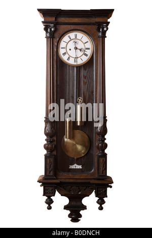 Old pendulum wall clock isolated on white. Stock Photo